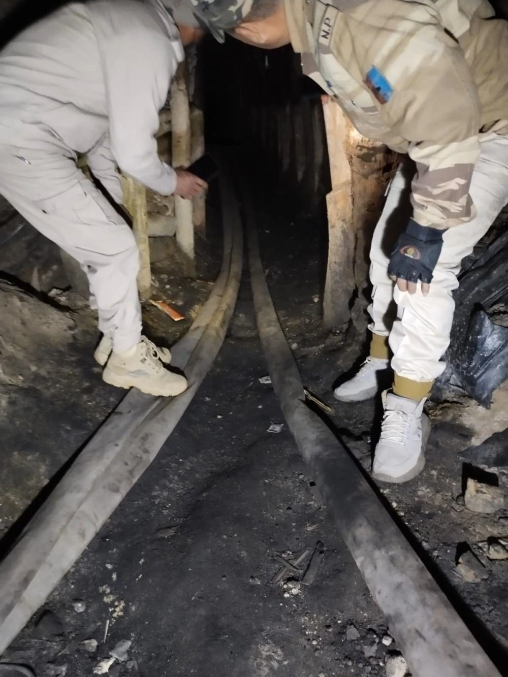 Wokha Police inspects the rat-hole mine in Ruchayan village under Wokha district where a fire killed six workers and injured four on January 25. 2024. (Morung File Photo)